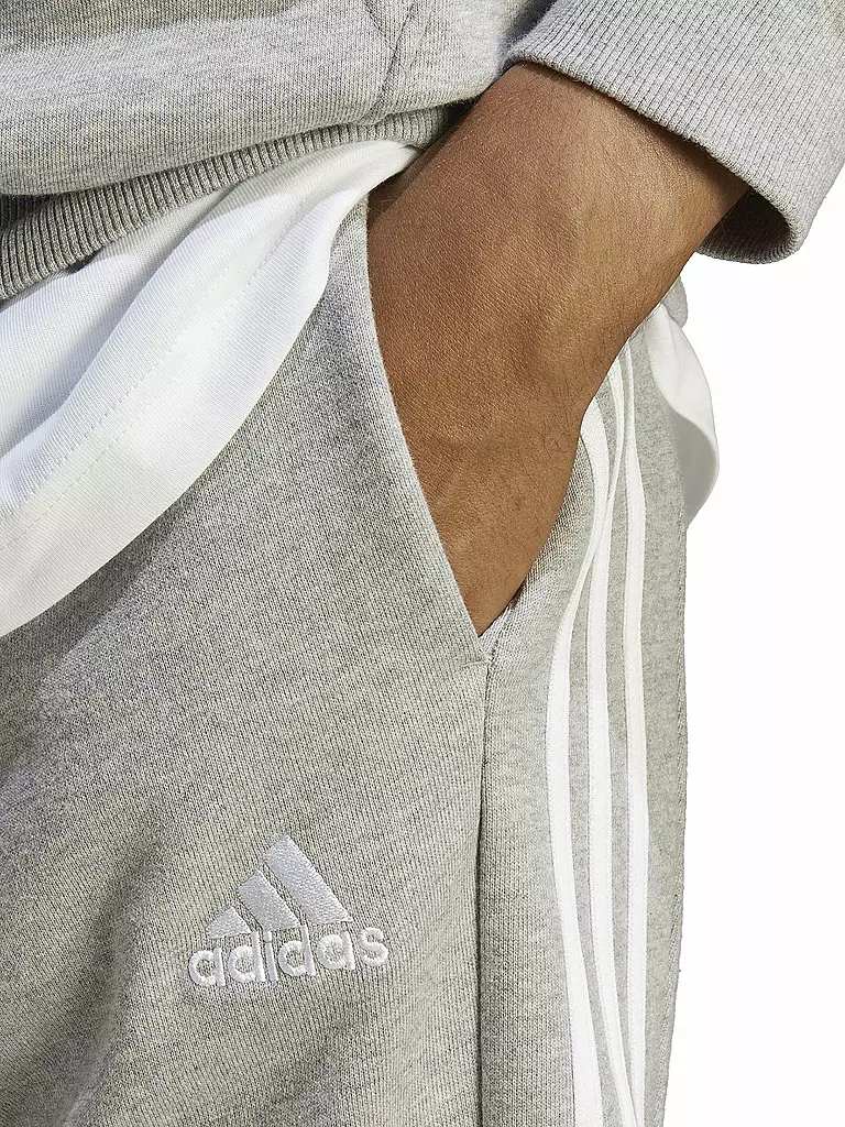 ADIDAS | Pantaloni da jogging da uomo Essentials French Terry con polsini affusolati e 3 strisce | Grigio