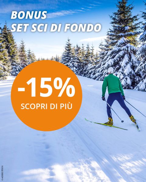 Una persona sta scendendo una collina innevata.