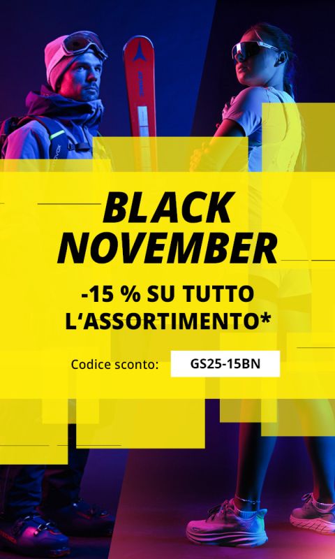 Un cartellone pubblicitario con un uomo in abbigliamento da sci sulla sinistra, una donna in abbigliamento sportivo sulla destra e forme geometriche gialle con la scritta "BLACK NOVEMBER -15% su tutto l'assortimento*" con un codice sconto "GS25-15BN".