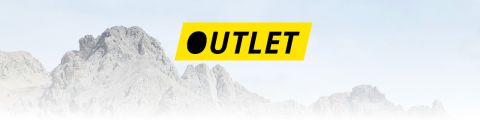 La parola "OUTLET" in nero su sfondo rettangolare giallo, con cime montuose innevate sullo sfondo.