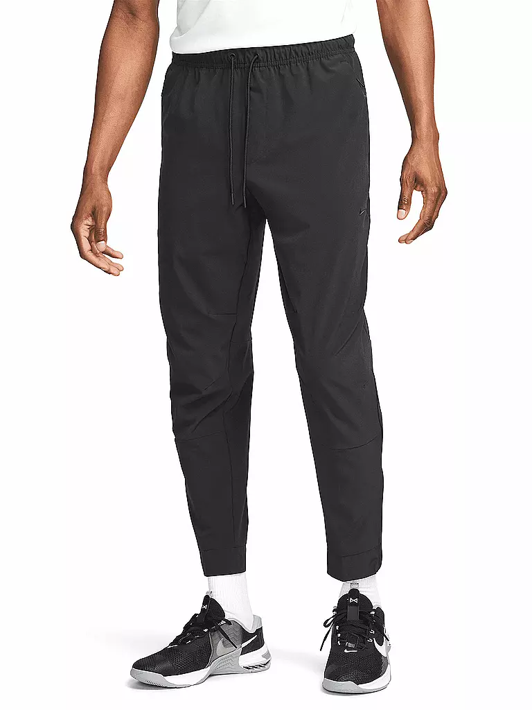 NIKE | Pantaloni da fitness Unlimited da uomo | Nero