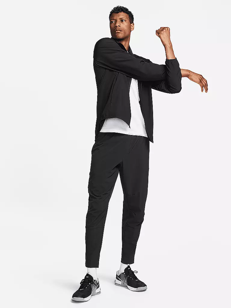 NIKE | Pantaloni da fitness Unlimited da uomo | Nero