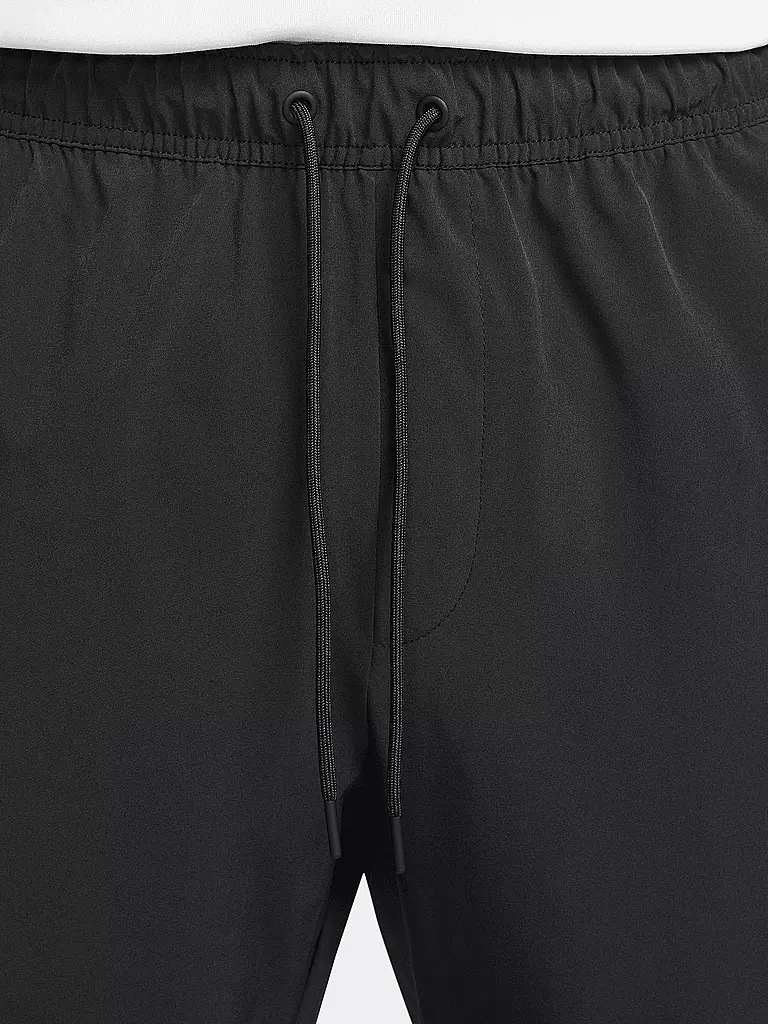 NIKE | Pantaloni da fitness Unlimited da uomo | Nero