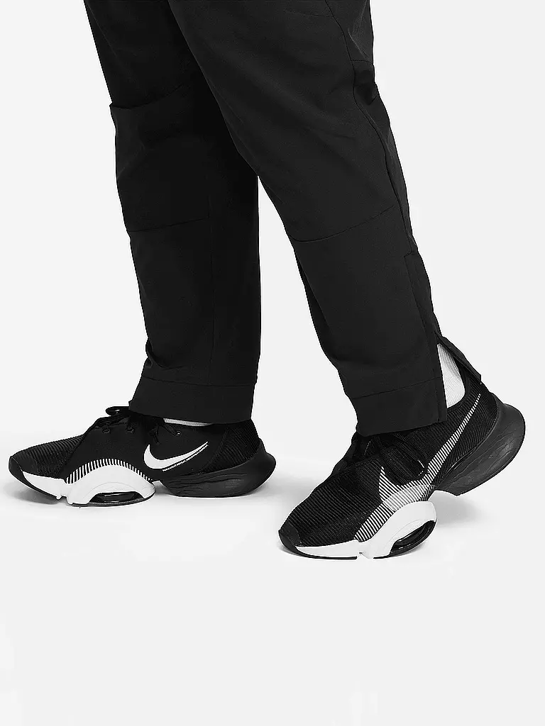 NIKE | Pantaloni da fitness Unlimited da uomo | 